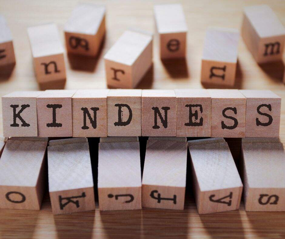 word blocks spelling out "kindness"
