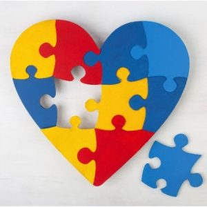autism heart with single puzzle piece removed